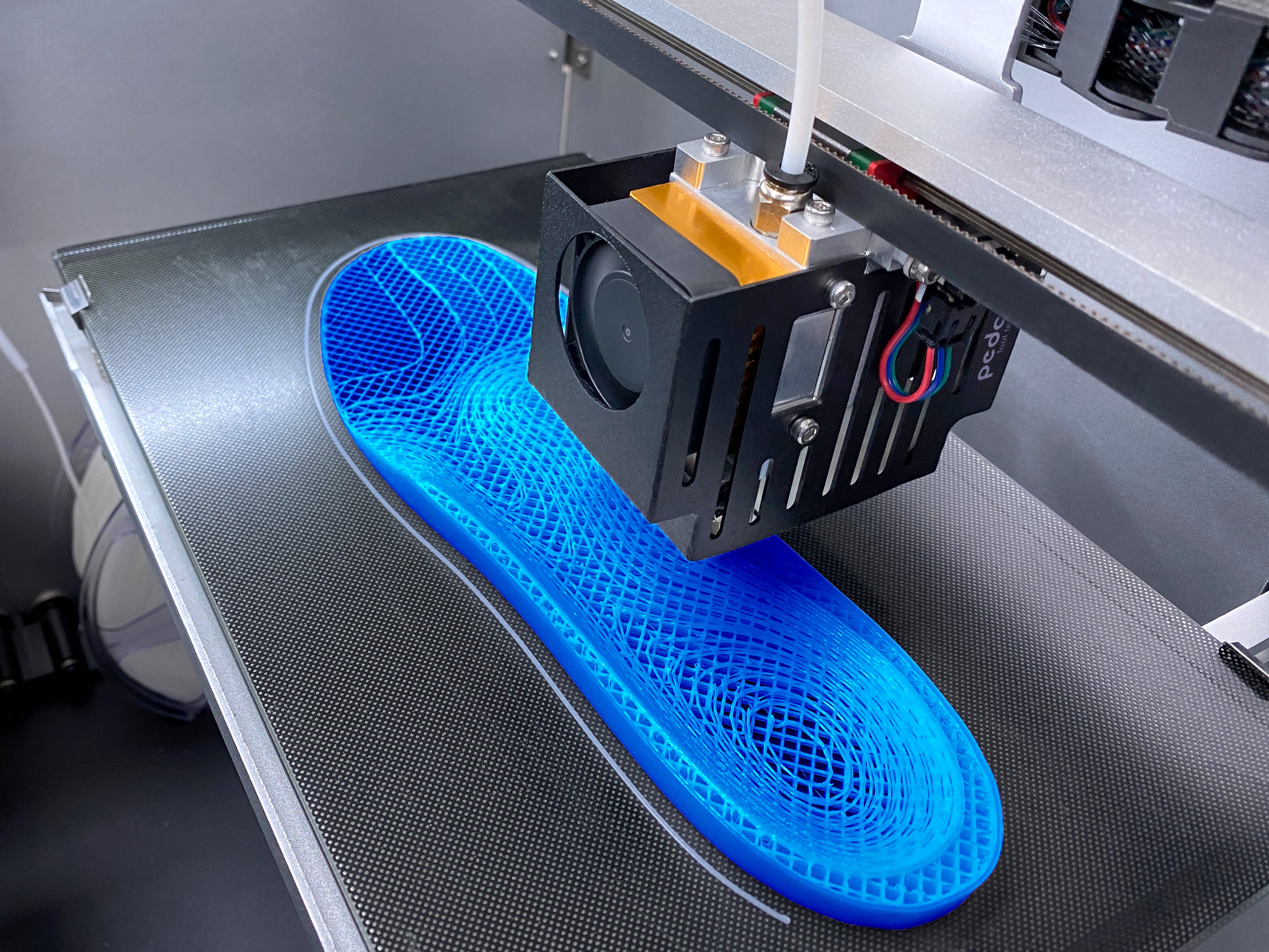 Einlage im 3D-Drucker, blaue 3D-Einlage